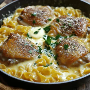 - 4 boneless, skinless chicken thighs - 2 tablespoons olive oil - Salt and freshly cracked black pepper to taste - 1 teaspoon garlic powder - 1 teaspoon onion powder - 1 cup low-sodium chicken broth - 8 ounces egg noodles - 1/2 cup heavy cream - 3 tablespoons unsalted butter - 1/2 cup finely grated Parmesan cheese - Fresh parsley, chopped (for garnish) Using fresh ingredients makes a big difference in flavor. Fresh chicken provides a juicy bite. Fresh herbs add brightness to the dish. When you use high-quality items, you make the meal taste better. It’s worth the extra effort. You can swap some ingredients if needed. Use chicken breast instead of thighs for a leaner dish. If you want it lighter, try using half-and-half instead of heavy cream. You can also use whole wheat noodles for a healthier option. Don't have Parmesan cheese? Try another cheese, like Pecorino or Grana Padano. These swaps help you enjoy this dish your way! Start by gathering your chicken thighs and seasoning them. Use salt, pepper, garlic powder, and onion powder. Make sure to coat both sides well. This adds great flavor to your dish. Heat olive oil in a large skillet over medium heat. When the oil shimmers, add the chicken thighs to the skillet. Sear them for about 5-7 minutes on each side. Look for a nice golden-brown crust. This gives the chicken flavor and texture. Check the internal temperature. It should reach 165°F (74°C) to ensure it is safe to eat. After cooking, remove the chicken and set it aside on a plate. Next, pour chicken broth into the same skillet. Scrape the bottom with a wooden spoon to get all the tasty bits. Bring this to a gentle simmer. Add the egg noodles to the broth and cook them. Follow the package instructions, usually 5-7 minutes, until they are al dente. Stir them often to keep them from sticking. Once the noodles are cooked, lower the heat. Stir in heavy cream, unsalted butter, and grated Parmesan cheese. Mix it well until everything is creamy and smooth. Slice the rested chicken into strips and return it to the skillet. Let it warm for a minute. Taste the dish and adjust seasoning if needed. Finally, serve it with chopped parsley on top for a fresh touch. This all comes together in about 30 minutes. For the complete details, refer to the Full Recipe. To make sure your chicken is perfectly cooked, start with the right heat. Heat olive oil in your skillet until it shimmers. This shows the oil is hot enough. Season your chicken on both sides with salt, pepper, garlic powder, and onion powder. This helps lock in flavor. Cook the chicken for 5-7 minutes on each side. It should be golden brown and reach 165°F (74°C) inside. Use a meat thermometer for accuracy. Let the chicken rest after cooking. This keeps it juicy and tender. Seasoning is key to a tasty dish. Use salt and freshly cracked black pepper for a classic flavor. Garlic powder and onion powder add depth. You can also try adding smoked paprika or Italian herbs for extra zest. Don't be afraid to taste as you go. Adjusting the seasonings helps create the perfect balance. Remember, a little goes a long way, so start small. To keep your noodles creamy, add the heavy cream slowly. Stir it in after the noodles are cooked. Mix in the unsalted butter and Parmesan cheese next. This creates a rich sauce that coats the noodles well. If it seems too thick, add a splash of chicken broth. This will help loosen the sauce while keeping it creamy. Stir well to ensure every noodle is coated. {{image_4}} You can easily add vegetables to this dish. Vegetables boost nutrition and flavor. Try adding broccoli or spinach. They cook quickly and add color. Peas also work well. Just toss them in while cooking the noodles. Carrots and bell peppers are great options too. Chop them small and mix them in with the chicken. This way, you enjoy a balanced meal. If you want a change from chicken, try other proteins. Thinly sliced beef or pork can work well. Cook them until they are browned and tender. You can also use shrimp for a seafood twist. Just make sure they are cooked through. Tofu is a great plant-based option. It soaks up flavors and adds protein. Choose whichever protein you love most. Cheese can change the taste of your dish. Parmesan is classic, but you can try others. Grated mozzarella gives a nice stretch. It melts wonderfully into the noodles. Feta cheese adds a tangy kick. For a richer flavor, try goat cheese. Just mix it in at the end. Experiment with your favorites to find what you love best. Enjoy your meal with these fun twists! To keep your One-Pan Chicken with Buttered Noodles fresh, start by letting it cool. Place leftovers in an airtight container. Store it in the fridge for up to three days. This helps maintain taste and texture. If you have a lot, consider dividing it into smaller containers. This makes it easy to reheat later. When you're ready to enjoy your leftovers, reheat them gently. Use a skillet over low heat for best results. Add a splash of chicken broth or water to keep things moist. Stir often to avoid burning. You can also microwave it in short bursts. Cover it with a damp paper towel to trap steam. This helps keep the noodles creamy. If you want to save your dish for later, freezing is a great choice. Allow it to cool completely before transferring to a freezer-safe container. You can also use freezer bags. Make sure to squeeze out any air to prevent freezer burn. It will stay tasty for up to three months. When you're ready to eat, thaw it in the fridge overnight before reheating. This keeps the flavors intact. Yes, you can make this dish gluten-free. Use gluten-free egg noodles instead of regular ones. Check the package for cooking times, as they may vary. You can also ensure that the chicken broth is gluten-free by reading labels carefully. To make it creamy without heavy cream, try using milk and a bit of flour. Mix one cup of milk with two tablespoons of flour. Whisk them together until smooth. Add this mixture when you stir in the butter and cheese. It will give you a nice, creamy texture. Several sides go well with this dish. Here are some ideas: - Steamed broccoli - Garlic bread - A fresh garden salad - Roasted vegetables - Mashed potatoes These sides will complete your meal nicely and add more flavor and nutrition. For the full recipe, be sure to check the detailed steps above. We covered a lot about making One-Pan Chicken with Buttered Noodles. Fresh ingredients are key to great taste. You learned how to prepare, cook, and season the dish. I shared tips for achieving perfect chicken and creamy noodles. Variations allow you to switch proteins and add vegetables. Remember, proper storage keeps leftovers fresh and tasty. Now, you can enjoy delicious meals that fit your needs!