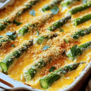 When making a cheesy asparagus casserole, you need a mix of fresh and tasty ingredients. Here’s what you will need: - 1 pound fresh asparagus, trimmed and cut into 2-inch pieces - 1 cup cooked quinoa (or substitute with rice for a non-quinoa option) - 1 small onion, finely chopped - 2 cloves garlic, minced - 1 cup sharp cheddar cheese, grated - 1 cup mozzarella cheese, grated - 1 cup heavy cream (or half-and-half for a lighter alternative) - 1/2 cup breadcrumbs - 2 tablespoons olive oil - Salt and pepper to taste - 1 teaspoon paprika - 1/2 teaspoon dried thyme These ingredients come together to create a dish that is rich and creamy. Fresh asparagus is key to a vibrant flavor. Quinoa or rice adds a hearty base. Onions and garlic bring depth to the dish. The cheeses melt beautifully, creating that gooey texture we all love. Heavy cream makes it rich, while breadcrumbs add a nice crunch. Using quality ingredients makes a big difference. Fresh asparagus gives the best taste. If you want a lighter touch, use half-and-half instead of heavy cream. This recipe uses a blend of cheeses for flavor and texture. Don't forget to check out the Full Recipe for more details on preparation! Start by preheating your oven to 375°F (190°C). This step makes sure your casserole cooks evenly. Next, grease a 9x13-inch baking dish. Use cooking spray or a bit of butter. This helps the casserole come out easily after baking. In a large skillet, pour in 2 tablespoons of olive oil. Heat it over medium heat. Add 1 small chopped onion and cook for 3-4 minutes. Your onion should become soft and clear. Then, add 2 minced garlic cloves. Cook for 1 more minute until it smells great. Now it’s time to prepare your asparagus. Add 1 pound of trimmed asparagus that you cut into 2-inch pieces. Season with salt, pepper, and 1/2 teaspoon of dried thyme. Sauté the asparagus for about 5 minutes. It should be bright green and a little soft, but still crunchy. Remove your skillet from the heat and let it cool. Grab a big mixing bowl. Combine 1 cup of cooked quinoa (or rice if you prefer) with the sautéed onion and asparagus. Add half of the grated sharp cheddar cheese and half of the mozzarella cheese, which is 1 cup each. Pour in 1 cup of heavy cream, or use half-and-half if you want it lighter. Now, stir until everything is mixed well and coated. Pour this mixture into your greased baking dish. Spread it out evenly so it cooks well. For the topping, sprinkle the rest of the cheddar and mozzarella cheeses on top. Then, add 1/2 cup of breadcrumbs evenly across the cheese. Finish with a light sprinkle of paprika for flavor and color. Your casserole is ready to bake! To pick the best asparagus, look for bright green stalks. The tips should be tightly closed and firm. Avoid any that appear wilted or have dark spots. Store fresh asparagus upright in a jar with water, like flowers. Cover the tops with a plastic bag to keep them fresh longer. For this casserole, sharp cheddar melts beautifully and adds rich flavor. Mozzarella also works well for its stretchy texture. If you want to mix things up, try gouda or gruyère for a twist. You can use a mix of cheeses for a more complex taste. To ensure your asparagus has the perfect texture, sauté it for just a few minutes. You want it tender but still crisp. Overcooking can make it mushy, which isn’t ideal for this dish. Keep an eye on it to maintain that lovely crunch. For the full recipe, be sure to follow the steps closely. Happy cooking! {{image_4}} You can switch grains in this casserole. If you want a different taste, use rice instead of quinoa. Rice cooks easily and gives a nice texture. You can also try farro or barley for a chewier bite. Both options add a new flavor to the dish while still being hearty. For a dairy-free option, you can swap heavy cream with coconut milk or almond milk. These plant-based milks keep the creamy texture. Instead of regular cheese, look for plant-based cheese options. Brands like Daiya or Violife offer great flavors that melt well. These swaps let you enjoy the casserole without dairy. To kick up the flavor, add herbs and spices. Fresh basil or oregano can bring a bright taste. You can also mix in a bit of red pepper flakes for heat. Feel free to add other veggies too! Bell peppers or mushrooms work well and add nutrition. Get creative and make this dish your own! After you enjoy the cheesy asparagus casserole, store any leftovers in a safe way. Place the casserole in an airtight container. This keeps it fresh and tasty. You can refrigerate it for up to four days. If you want to save it longer, freeze it. To freeze, let the casserole cool first. Then, wrap it tightly in plastic wrap and foil. This helps prevent freezer burn. It can last for up to three months in the freezer. When it's time to eat leftovers, reheating is key. To keep it moist, use the oven. Preheat the oven to 350°F (175°C). Place the casserole in a baking dish. Cover it with foil to lock in moisture. Heat for about 20-25 minutes. If you prefer a microwave, use it too. Place a portion in a microwave-safe dish. Cover it with a damp paper towel to keep it from drying out. Heat for 1-2 minutes, checking every 30 seconds. Enjoy your tasty dish again! Cheesy Asparagus Casserole lasts about 3 to 5 days in the fridge. Make sure to store it in an airtight container. If it appears moldy or has an off smell, it's time to toss it out. Yes, you can prepare this casserole a day in advance. Just follow the recipe steps but stop before baking. Cover it tightly and place it in the fridge. When you’re ready, bake it straight from the fridge, adding a few extra minutes to the cooking time. Definitely! You can swap quinoa for rice or even use farro. If you want a kick, add some diced jalapeños. You could also change the cheese types. Try using gouda or feta for a different flavor. Personalizing it makes it even more fun! For the [Full Recipe], refer to the previous sections. This blog post covered how to make a Cheesy Asparagus Casserole from start to finish. You learned about the ingredients, like fresh asparagus and cheese, and how to prepare them. I shared tips on selecting the best asparagus and cheese for your dish. We explored variations, including alternative grains and dairy-free options. Lastly, I provided storage tips to help keep leftovers fresh. Cooking can be fun. Enjoy experimenting with flavors and ingredients to make the dish your own!