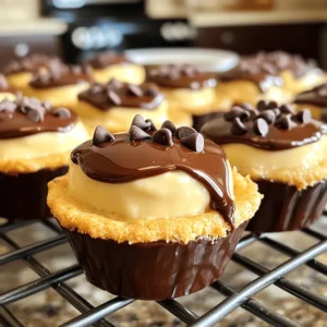 To make Easy Boston Cream Pie Cookie Bites, you need the right ingredients. Here’s the list: - 1 cup all-purpose flour - 1/2 teaspoon baking powder - 1/4 teaspoon salt - 1/2 cup unsalted butter, softened to room temperature - 1/2 cup granulated sugar - 1 large egg, at room temperature - 1 teaspoon pure vanilla extract - 1/2 cup pastry cream (store-bought or homemade) - 1/2 cup semisweet chocolate chips - 1 tablespoon heavy cream These ingredients work together to create a delightful treat that brings joy with every bite. The all-purpose flour forms the base, while baking powder helps the cookie bites rise. Salt enhances the flavors, and butter adds richness. Sugar gives sweetness, and the egg helps bind everything together. Vanilla extract adds a lovely aroma. The pastry cream is the star, giving a creamy center. Semisweet chocolate chips and heavy cream create a luscious ganache that tops it all off. Each ingredient plays an important role in making these cookie bites special. For the full recipe, be sure to check out the details! 1. Preheat oven and prepare muffin tin: Start by setting your oven to 350°F (175°C). Next, line a mini muffin tin with paper liners. This step helps with easy removal later. 2. Mixing dry ingredients and wet ingredients: In a medium bowl, whisk together 1 cup of all-purpose flour, 1/2 teaspoon of baking powder, and 1/4 teaspoon of salt. Set this aside. In a larger bowl, beat 1/2 cup of softened unsalted butter and 1/2 cup of granulated sugar until light and fluffy. Then, add 1 large egg and 1 teaspoon of pure vanilla extract, mixing until smooth. 3. Combining mixtures and portioning dough: Gradually add the dry mixture to the wet mixture. Stir gently until just combined. Be careful not to overmix. Use a tablespoon to scoop and drop the dough into each muffin cup, filling them halfway. 4. Baking time and cooling tips: Place the muffin tin in the oven. Bake for 10-12 minutes. You'll know they are done when the edges are lightly golden and a toothpick comes out clean. After baking, cool the bites in the pan for 5 minutes. Then, transfer them to a wire rack to cool completely. 5. Techniques for pastry cream filling: Once the cookie bites are cool, use a small piping bag or a teaspoon to fill each bite with about 1 teaspoon of pastry cream. This gives them a creamy center. 6. Making and applying chocolate ganache: To make the chocolate ganache, combine 1/2 cup of semisweet chocolate chips and 1 tablespoon of heavy cream in a microwave-safe bowl. Heat in 15-second intervals, stirring until smooth. Drizzle the ganache over each filled cookie bite or dip them directly into the chocolate for a tasty finish. Allow the chocolate to set before serving. For the complete recipe, check out the [Full Recipe]. To keep your cookie bites tender, do not overmix the dough. Mixing just until combined helps keep them soft. Use room temperature butter and eggs. This makes it easier to blend and gives a nice texture. For cooling, let the cookie bites sit in the pan for five minutes. Then, move them to a wire rack. This helps them cool evenly and keeps them from getting soggy. For a special touch, arrange cookie bites on a pretty platter. Dust them with powdered sugar. Add fresh strawberries or mint leaves to brighten the display. These cookie bites pair well with milk, coffee, or tea. The rich chocolate and creamy filling make a great match with your favorite drink. If you're feeling fancy, serve them with a scoop of vanilla ice cream for a fun treat. Enjoy! {{image_4}} You can play with flavors in your Boston Cream Pie Cookie Bites. Try different fillings like fruit or cream. For a fruity twist, consider using a layer of raspberry or strawberry jam. This adds a fresh burst of flavor. You can also swap out the pastry cream for whipped cream or even lemon curd for a zesty kick. For toppings, the options are endless! You can sprinkle chopped nuts like almonds or hazelnuts for a crunchy texture. If you want something fun, add colorful sprinkles on top of the chocolate. This makes the cookie bites look festive and exciting. If you need gluten-free options, you can use almond flour or a gluten-free flour blend. These flours work well in cookie recipes. Just make sure to check the blend contains a binding agent, like xanthan gum. This helps keep the texture right. For vegan substitutions, replace the egg with a flax egg or applesauce. Use vegan butter instead of regular butter. You can also swap the heavy cream with coconut cream for the ganache. These changes keep the treats tasty while meeting dietary needs. For the Full Recipe, check out the detailed instructions. Enjoy making these delightful bites! To keep your Boston Cream Pie Cookie Bites fresh, store them in an airtight container. This helps to maintain their soft texture and flavor. Place a piece of parchment paper between layers if stacking. Avoid direct sunlight and heat, as they can dry out the cookies. They can last up to five days at room temperature. For longer shelf life, you can freeze your cookie bites. First, ensure they are cool. Then, wrap each cookie bite tightly in plastic wrap. Place them in a freezer-safe bag or container. They can stay fresh for up to three months in the freezer. If you freeze your cookie bites, you’ll want to reheat them before serving. To do this, take them out of the freezer and let them thaw in the fridge overnight. When ready to enjoy, place them on a microwave-safe plate. Heat them for about 10 to 15 seconds. This will warm them up without making them tough. For serving leftovers, try to keep them at room temperature. If they seem a bit dry, add a small dollop of pastry cream on top. This keeps them moist and adds a fresh touch. You can also drizzle a bit of chocolate ganache over the top for extra flavor. Enjoy your delightful treats! Can I use store-bought pastry cream? Yes, you can use store-bought pastry cream. It saves time and is often very tasty. Just make sure it is fresh. It’s a great way to keep your cookie bites simple yet delicious. How do we ensure even baking? To ensure even baking, preheat your oven fully. Use an oven thermometer if unsure. Also, make sure to space the muffin tin evenly in the oven. This helps heat circulate well around the cookie bites. Substituting ingredients for dietary needs If you need to make swaps, here are a few easy ideas: - Use gluten-free flour instead of all-purpose flour. - Replace butter with coconut oil for dairy-free bites. - For egg-free, try a flaxseed meal mixture. Best types of chocolate for ganache I recommend using semisweet chocolate chips for a rich flavor. Milk chocolate works too, but it’s sweeter. Dark chocolate gives a nice contrast to the creamy filling. Choose what fits your taste best! For a detailed guide, check out the Full Recipe. You now have a complete guide to making delicious cookie bites. We covered ingredients, step-by-step instructions, tips, and tasty variations. Remember, the right techniques make a big difference in flavor and texture. Feel free to get creative with fillings and toppings. Proper storage keeps your treats fresh, so don’t skip that. Enjoy your baking adventure and share these cookie bites with family and friends. They’re sure to impress!