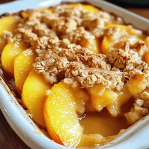 To make a great peach crumble, you need these main ingredients: - 4 ripe peaches, peeled and thinly sliced - 1 tablespoon fresh lemon juice - 1/4 cup packed brown sugar - 1 teaspoon pure vanilla extract - 1 cup old-fashioned rolled oats - 1/2 cup all-purpose flour - 1/2 cup packed brown sugar (for crumble topping) - 1/2 teaspoon ground cinnamon - 1/4 cup unsalted butter, chilled and cubed - Pinch of sea salt These ingredients make a tasty mix of sweet and tangy flavors. The peaches give a juicy texture, while the oats and butter create a crunchy topping. The lemon juice and vanilla add brightness to each bite. To make your peach crumble even better, you can add some optional ingredients: - Nuts (like almonds or pecans) for crunch - Coconut flakes for a tropical twist - Raisins or dried cherries for extra sweetness - A splash of bourbon or rum for depth These choices can give your crumble a unique flair. Feel free to experiment and find what you love most! If you don’t have some ingredients, here are some easy swaps you can try: - Use nectarines instead of peaches for a similar taste. - Swap brown sugar with white sugar or maple syrup. - Use gluten-free flour if you need a gluten-free option. - Replace butter with coconut oil for a dairy-free version. These substitutions can help you make the crumble fit your needs. Just remember to adjust the flavors as you go! For the full recipe, check out the instructions above. Start by washing your peaches. Use ripe ones for the best flavor. Peel each peach, then slice them thinly. Place the slices in a large bowl. Add one tablespoon of fresh lemon juice to keep them bright. Next, sprinkle in 1/4 cup of packed brown sugar and one teaspoon of pure vanilla extract. Gently toss the peach slices until they are well coated. This step helps the flavors blend together beautifully. In another bowl, mix the dry ingredients for the crumble. Combine one cup of old-fashioned rolled oats, 1/2 cup of all-purpose flour, 1/2 cup of packed brown sugar, and 1/2 teaspoon of ground cinnamon. Add a pinch of sea salt for taste. Stir these ingredients well to ensure they mix evenly. Now, it’s time to add the butter. Use 1/4 cup of chilled, cubed unsalted butter. With your fingertips or a pastry cutter, blend the butter into the dry mix. Keep mixing until it looks like coarse crumbs, about the size of peas. Preheat your oven to 350°F (175°C). While the oven heats, grab an 8x8 inch baking dish. Spread the peach mixture evenly across the bottom. Make sure the layer is nice and even. Next, sprinkle the crumble topping generously over the peaches. This creates a crunchy layer on top. Place the baking dish in the oven and bake for 30 to 35 minutes. You want the top to turn golden brown and see the peaches bubbling around the edges. Once done, take it out and let it cool for 5 to 10 minutes before serving. Enjoy your peach crumbles warm, and for an extra treat, add a scoop of vanilla ice cream on top! Check out the Full Recipe for more details. To get a great crumble texture, use chilled butter. Cold butter helps create that nice, flaky topping. When you mix it with the dry ingredients, do not overwork it. Stop when it looks like coarse crumbs. This keeps the topping light and crisp. If your peaches are too firm, you can ripen them fast. Place them in a paper bag. Add a ripe banana or apple to speed up the process. The gases they give off help the peaches soften. Check them daily until they reach your desired softness. If you're short on time, use pre-sliced peaches from the store. They save you prep time and still taste good. You can also make the crumble topping ahead. Store it in the fridge for up to three days. This way, you can quickly assemble the dish when you're ready to bake. For the full experience, check out the Full Recipe for more details. {{image_4}} You can add a fun twist to your peach crumble. Try mixing in shredded coconut. Use one cup of unsweetened shredded coconut in the crumble topping. This adds a tropical flavor that pairs well with the peaches. The coconut gives a nice chew and a hint of sweetness. This variation is perfect for a summer treat. For a burst of flavor, mix berries with your peaches. You can use blueberries, raspberries, or strawberries. Just add one cup of mixed berries to your peach mixture. The tartness of the berries balances the sweetness of the peaches. This fusion brings color and extra nutrients to your crumble. It’s a great way to use fresh or frozen fruit. If you need a gluten-free option, swap the all-purpose flour with gluten-free flour. Almond flour or oat flour work well. Make sure your oats are certified gluten-free too. This change keeps the texture while making it safe for gluten-sensitive eaters. You can enjoy the same great taste without worry. For more detailed guidance, check the [Full Recipe]. You can store leftover peach crumbles in an airtight container. Make sure the crumble cools completely before sealing it. This helps keep the texture nice. You can store it in the fridge for up to three days. If you want it to last longer, consider freezing it. To freeze peach crumbles, let them cool first. Cut the crumble into portions for easy serving. Wrap each piece in plastic wrap, then place them in a freezer-safe bag. This keeps the flavors fresh. You can freeze the crumble for up to three months. When you’re ready to enjoy, just thaw it in the fridge overnight. Reheating peach crumbles is simple. Preheat your oven to 350°F (175°C). Place the crumble in an oven-safe dish. Cover it with foil to prevent over-browning. Heat for about 15-20 minutes. This method keeps the topping crispy and the peaches warm. You can also microwave it, but the oven works best for texture. Enjoy your delicious peach crumbles warm! Yes, you can use frozen peaches. Thaw them first and drain excess liquid. This keeps your crumble from getting too soggy. Frozen peaches work well, but fresh ones give the best taste. If you use frozen, add a bit of extra sugar to balance the tartness. Look for a golden-brown top and bubbling around the edges. This shows the peaches are hot and the crumble is crisp. It's best to bake for about 30-35 minutes at 350°F (175°C). If the top looks too dark, check the peaches underneath. Peach crumbles shine with vanilla ice cream or whipped cream on top. A scoop of yogurt can add a nice tang. For a twist, try serving it with a drizzle of caramel sauce. Enjoy it warm for the best experience! For the full recipe, check the detailed instructions above. We explored how to make easy peach crumbles, from ingredients to baking tips. You learned about key ingredients, tasty variations, and how to store leftovers. Each step helps you create a delicious dessert with minimal hassle. Remember, the right peaches and a perfect crumble topping can make all the difference. Enjoy trying these tips and tricks to impress your friends and family. Happy baking!