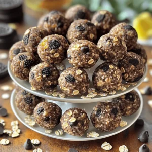 - 1 cup rolled oats - 1/2 cup vanilla protein powder - 1/2 cup almond butter (or substitute with peanut butter) - 1/4 cup honey or maple syrup - 1/4 cup crushed Oreo cookies (approximately 4-5 cookies) - 2 tablespoons unsweetened cocoa powder - 1/4 cup dark chocolate chips (optional for extra indulgence) - A pinch of salt When I make Oreo Protein Balls, I start with simple ingredients. Each one plays a key role in flavor and texture. Rolled oats give a great base. They add fiber and help bind the balls. Vanilla protein powder boosts the protein and adds sweetness. Almond butter or peanut butter adds creaminess and a nutty taste. Honey or maple syrup brings in sweetness. I love using honey for its rich flavor. Crushed Oreo cookies add fun and crunch. Unsweetened cocoa powder gives a deep chocolate taste without extra sugar. Dark chocolate chips are optional, but they make each bite more indulgent. Finally, a pinch of salt balances all the flavors. Keep these ingredients handy, and you're ready to whip up a tasty, healthy snack. For the full recipe, check out the details above. First, grab a large mixing bowl. Add 1 cup of rolled oats, 1/2 cup of vanilla protein powder, and 1/4 cup of crushed Oreo cookies. You can crush the Oreos by placing them in a zip-top bag and using a rolling pin. This fun method works well! Stir these dry ingredients together until they are mixed well. Next, add 2 tablespoons of unsweetened cocoa powder and a pinch of salt. Mix again until everything is combined. In another bowl, combine 1/2 cup of almond butter and 1/4 cup of honey (or maple syrup). Use a spoon or whisk to blend them. You want a smooth and creamy mixture. This will give the protein balls a nice sweetness and texture. Now, pour the wet mixture into the bowl with the dry ingredients. Stir everything together. You want to make sure it all mixes smoothly. If the mixture feels dry or crumbly, add a bit more almond butter or honey. Add only one teaspoon at a time. Keep stirring until a nice dough forms. If you want extra chocolate, now is the time to add 1/4 cup of dark chocolate chips. Fold them gently into the mixture. With clean hands, take about one tablespoon of the mixture and roll it into a ball shape. Place each ball on a parchment-lined baking sheet. Leave some space between the balls. This helps them hold their shape. Keep rolling until you shape all of the mixture into balls. Once you're done, cover the baking sheet with plastic wrap or place it in the fridge. Chill for about 30 minutes. This helps the protein balls firm up and makes them easier to eat. For the full recipe, don't forget to check the details above! To get the right texture in your Oreo protein balls, adjust the moisture. You can add more almond butter or honey. Start with a tablespoon if the mixture feels dry. This helps the balls stick together. If they are too wet, add a little more protein powder. Make sure to mix in the chocolate chips well. Distribute them evenly throughout the mix. This way, every bite has that rich chocolate flavor you love. When serving, arrange the protein balls on a nice plate. You can stack them high for a fun look. A tiered dessert stand really showcases them. If you plan to gift these, use a clear jar or a decorative box. Add a ribbon for a special touch. It makes a great present for friends or family. Get your kids involved in rolling the balls. They love to help and it makes cooking fun! You can even let them pick their favorite add-ins. Try adding mini marshmallows or different nuts. Customizing flavors keeps everyone excited about the snack. This way, you make memories while enjoying a delicious treat together. {{image_4}} You can switch up the flavor of your Oreo protein balls easily. Try using other cookie flavors like peanut butter or birthday cake. Each flavor brings a fun twist. You can also add nut butters or spreads for more richness. Almond butter works great, but peanut butter adds a nice kick too. Get creative! Want to make these protein balls even healthier? Use plant-based protein powder instead of regular powder. This makes them great for vegans or those who want a lighter option. You can also choose low-sugar or sugar-free sweeteners. This way, you can enjoy the taste without the extra sugar. Boost the nutrition of your Oreo protein balls by adding seeds. Chia seeds or flaxseed are fantastic choices. They add healthy fats and fiber. You can also toss in dried fruits or nuts for extra texture and taste. Almonds or cranberries can elevate the flavor and nutrients. These small changes make your snack even better! For the full recipe, check out the [Full Recipe]. To keep your Oreo protein balls fresh, store them in an airtight container. This keeps moisture out and flavor in. You can place them in the fridge or freezer. Refrigeration is great for short-term storage. If you want to keep them longer, freezing is best. In the fridge, these protein balls last about one week. If you freeze them, they can stay good for up to three months. Always check for signs of spoilage. If you see mold or an off smell, it’s time to toss them. Packaging is key for easy transport. You can use small bags or containers. This makes them easy to grab when you need a snack. Aim for one or two balls per serving. This gives you a nice boost without overdoing it. Enjoy the tasty and healthy snack whenever you want! Oreo Protein Balls take about 15 minutes to prepare and 30 minutes to chill. So, you can make them in under an hour. This quick time makes them perfect for a last-minute snack or treat. Yes, you can easily make these protein balls vegan. Instead of honey, use maple syrup. For the protein powder, choose a plant-based option. Use almond butter or peanut butter as your base. These small changes keep the flavor while making it vegan-friendly. Oreo Protein Balls can be a good snack option. They have protein from the powder and healthy fats from nut butter. The oats provide fiber, which is great for digestion. However, they also have sugar from the cookies and syrup. Enjoy them as a treat, but remember moderation is key. Definitely! You can try different cookies for fun flavors. Think of chocolate chip, peanut butter, or even mint cookies. Each will give your protein balls a unique twist. Get creative and find your favorite! You can add extra ingredients to make them your own. Try adding nuts, seeds, or even dried fruit. If you want more chocolate, mix in chocolate chips. Adjust the sweetness by adding less syrup. Personalizing the recipe is easy and fun! For the full recipe, check out the detailed instructions above. You learned how to make tasty Oreo Protein Balls with easy steps. We covered the ingredients, mixing techniques, and storage tips. You can even customize them with different flavors or extra nutrients. Remember, these treats can fit any diet and be a fun project with family. Enjoy making these delicious snacks for yourself or to gift others!