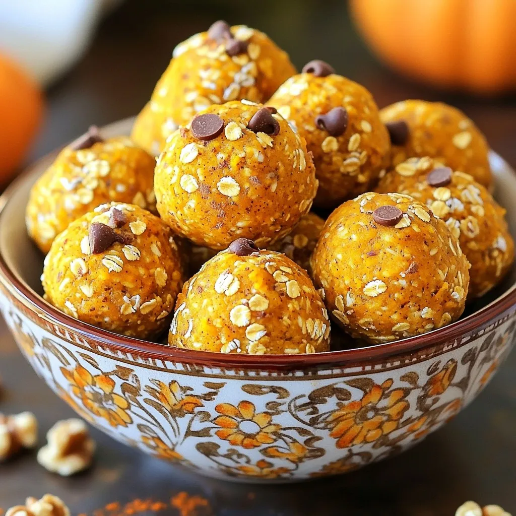 - 1 cup rolled oats - 1/2 cup pumpkin puree - 1/4 cup nut butter (almond or peanut) - 1/4 cup honey or maple syrup - 1 teaspoon vanilla extract - 1 tablespoon pumpkin pie spice - A pinch of salt - 1/4 cup chopped walnuts or pecans - 1/4 cup chocolate chips or raisins When making No-Bake Pumpkin Pie Energy Bites, you need a few key ingredients. First, rolled oats provide a hearty base. Pumpkin puree adds moisture and flavor. Nut butter gives creaminess and healthy fats. Honey or maple syrup sweetens the bites. Vanilla extract brings out the flavors. Pumpkin pie spice adds warmth and a hint of fall. Finally, a pinch of salt balances everything. You can also customize your bites with optional ingredients. Chopped walnuts or pecans add crunch. Chocolate chips or raisins can sweeten the bites further. These small changes can make a big difference. Feel free to play around with these ingredients. The core flavors work well together, but it’s fun to add your twist. You might find a new favorite combination! In a large bowl, combine the rolled oats, pumpkin puree, nut butter, honey (or maple syrup), and vanilla extract. Use a spoon or spatula to mix well. You want a smooth and uniform texture. This base brings all the flavors together, making each bite delicious. Next, sprinkle in the pumpkin pie spice and a pinch of salt. Mix again until you see the spices evenly spread. This step adds warmth and depth to your bites, making them feel like fall in your mouth. Now, it's time to fold in some optional ingredients. You can add chopped walnuts or pecans for a nice crunch. If you like sweetness, throw in some chocolate chips or raisins. Gently stir to mix these in without overdoing it. This way, you keep the texture just right. With slightly damp hands or a cookie scoop, portion the mixture into bite-sized balls. Aim for balls that are about 1 inch in diameter. Place them on a parchment-lined baking sheet. Make sure they have space between them, so they do not stick together. Finally, cover the baking sheet and refrigerate the energy bites for at least 30 minutes. This chilling time helps them firm up, making them easier to eat. After that, they are ready to enjoy as a tasty snack anytime! To get the best bites, refrigerate them for at least 30 minutes. This step helps them firm up nicely. You want a good balance of soft and firm. When you roll the bites, dampen your hands slightly. This makes it easier to shape them without sticking. For a fun twist, serve these bites in a decorative bowl. You can even sprinkle a bit of pumpkin pie spice on top for flair. Pair them with your favorite coffee or tea. This makes for a cozy snack that you can enjoy anytime. Feel free to switch up the nut butter. Almond butter gives a different taste than peanut butter. You can also experiment with spices. Try adding a bit more cinnamon or even some nutmeg for a new flavor. Each tweak can change the whole vibe of your bites! {{image_4}} If you need gluten-free options, use certified oats. They work great in this recipe. Just make sure to check the label. This way, you can enjoy these bites without worry. They still taste amazing. You can switch up the nut butter. Try almond or peanut butter for different tastes. You can also use sunflower seed butter if you want a nut-free option. Adding dried fruits like cranberries or apricots can add a fun twist. These swaps help keep things fresh and exciting. These energy bites can fit any holiday. For Christmas, add peppermint extract or some dried cherries. You can even swap the pumpkin spice for gingerbread spice. This makes them perfect for festive snacking. Feel free to get creative and mix flavors to match the season! To keep your No-Bake Pumpkin Pie Energy Bites fresh, use an airtight container. This will help lock in moisture and flavors. Make sure the container is clean and dry before adding the bites. You can stack them gently, but leave a little space to avoid sticking together. These energy bites last about one week in the fridge. Store them away from strong-smelling foods. The cool temperature will help keep their texture and taste intact. If you notice any signs of spoilage, it’s best to toss them out. If you want to keep them longer, freezing is a great option. To freeze, place the bites in a single layer on a baking sheet. Freeze for about two hours until firm. Then, transfer them to a freezer-safe bag or container. They can last up to three months in the freezer. When you’re ready to eat, just thaw them in the fridge overnight. Enjoy a tasty snack anytime! Yes, you can use sweet potato puree or butternut squash puree. Both have a similar taste and texture. You can even use applesauce for a different flavor. Just keep the same amount as you would for pumpkin puree. These energy bites stay fresh for about one week in the fridge. Store them in an airtight container. If you want them to last longer, you can freeze them. They will keep for up to three months in the freezer. Just remember to thaw them before eating. Each energy bite has about 70 calories. They contain 3 grams of protein, 3 grams of fat, and 11 grams of carbs. You also get about 1 gram of fiber. The bites are a great source of energy without being too heavy. Yes, you can make these bites nut-free. Use sunflower seed butter or soy nut butter instead of nut butter. You can also skip the nuts altogether. This way, you can still enjoy these bites without any nuts. In this article, we explored making delicious energy bites with simple ingredients. You learned about essential and optional items, as well as clear instructions for mixing, shaping, and serving. We covered tips for texture and variations for dietary needs, plus storage and frequently asked questions. Making these energy bites is easy and fun. You can enjoy them right away or save them for later. Experiment with flavors to fit your taste. Now you're ready to whip up your batch! Enjoy your treats and keep them healthy!