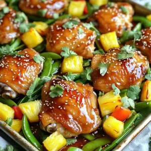 For this tasty dish, you will need: - 1 lb boneless, skinless chicken thighs - 1 cup fresh pineapple, cut into 1-inch cubes - 1 bell pepper (red or yellow), sliced into strips - 1 small red onion, cut into wedges - 1 cup snap peas, trimmed These ingredients bring together sweet and savory flavors. The chicken thighs stay juicy and tender during cooking. Fresh pineapple adds a tropical twist. Seasoning is key to making this dish pop. You will use: - 1/4 cup teriyaki sauce (store-bought or homemade) - 2 tablespoons extra-virgin olive oil - 2 cloves garlic, finely minced - 1 teaspoon fresh ginger, grated - Salt and freshly cracked black pepper, to taste - Sesame seeds, for garnish - Fresh cilantro leaves, for garnish The teriyaki sauce gives a rich flavor. Garlic and ginger provide a lovely aroma. Garnishes like sesame seeds and cilantro add a fresh touch. Feel free to make it your own! You can add: - Different vegetables like broccoli or carrots - A sprinkle of red pepper flakes for heat - A splash of lime juice for brightness These optional ingredients let you play with flavors. Mix and match based on what you love or have on hand. First, set your oven to 425°F (220°C). This is key for cooking the chicken and veggies right. Line a large rimmed baking sheet with parchment paper. This makes cleaning easy. In a medium bowl, mix together the teriyaki sauce, olive oil, minced garlic, and grated ginger. Whisk it until smooth and set it aside. Now, take the chicken thighs and place them on the baking sheet. Space them out so they cook evenly. Sprinkle salt and freshly cracked black pepper on top. Drizzle half of the teriyaki mixture over the chicken to add flavor. Next, put the cubed pineapple, sliced bell pepper, onion wedges, and snap peas around the chicken. This adds color and makes it look nice. Pour the rest of the teriyaki mixture over the chicken and veggies. This boosts the taste even more. Once everything is arranged, pop the baking sheet in the preheated oven. Bake for 20-25 minutes. Check the chicken; it should reach 165°F (75°C) to be safe to eat. The vegetables should be tender but still bright in color. After baking, carefully take the sheet out of the oven. Let it rest for a few minutes. This allows the juices to settle in the chicken. For the final touch, sprinkle sesame seeds on top. Add fresh cilantro leaves for a burst of color and flavor. Serve it warm and enjoy your savory teriyaki pineapple chicken! When picking chicken thighs, look for ones that are plump and moist. Fresh thighs should have a light pink color. Avoid any that appear dull or have an off smell. Bone-in thighs offer more flavor, but boneless thighs are easier to eat. Skinless thighs are lower in fat. However, a bit of fat adds flavor and juiciness. Always check the sell-by date to ensure quality. To get crisp and colorful veggies, cut them into even sizes. This helps them cook at the same rate. Use fresh vegetables for the best taste. Bell peppers and snap peas should be bright and firm. I recommend using a mix of textures, like crunchy snap peas with softer onions. Toss them in a bit of olive oil and season with salt and pepper. This enhances their natural flavors. Keep an eye on them as they cook, so they stay vibrant. For a tasty teriyaki sauce, start with a base of soy sauce. Add some honey or brown sugar for sweetness. A splash of rice vinegar gives it a nice tang. Fresh ginger and garlic add a rich flavor. Mix these ingredients in a bowl and whisk until smooth. If you want a thicker sauce, simmer it for a few minutes on the stove. This brings out the flavors. Homemade sauce allows you to control the taste and sweetness, making it special. {{image_4}} You can make a tasty vegetarian version. Swap out the chicken for firm tofu. Cut the tofu into cubes, just like the pineapple. Marinate it in the teriyaki sauce for flavor. This gives you a hearty base. Add all the same colorful veggies. You still get a mix of sweet and savory. This dish works great over rice or quinoa for a filling meal. Feel free to change the veggies based on what you have. You can use broccoli, carrots, or zucchini. Each adds its own taste and crunch. If you can't find snap peas, green beans work well too. Choose what you like or what's in season. This way, you make the dish your own and still enjoy that bright color. Chicken thighs are juicy and tender. They soak in the teriyaki sauce well. But if you want to go meatless, tofu is a great choice. Tofu absorbs flavors, making it delicious. Both chicken and tofu give you a protein boost. Choose what fits your diet or mood. You can't go wrong with either option! To keep your teriyaki pineapple chicken fresh, store it in an airtight container. Let the dish cool down first. Once it reaches room temperature, seal it tight. This method helps keep flavors intact and prevents drying. You can enjoy leftovers for up to three days in the fridge. For reheating, use the oven for the best flavor. Preheat your oven to 350°F (175°C). Place the chicken and veggies in an oven-safe dish. Cover it with foil to lock in moisture. Heat for about 15-20 minutes, or until warm throughout. You can also use the microwave, but be careful not to overcook it. If you want to save some for later, freezing works well. First, let the dish cool completely. Then, portion it into freezer-safe bags or containers. Squeeze out excess air to avoid freezer burn. You can freeze it for up to three months. To eat, thaw overnight in the fridge and reheat as mentioned. Yes, you can use chicken breasts. They cook faster than thighs. Make sure to slice them into even pieces. This will help them cook evenly. Keep an eye on the baking time. Chicken breasts take about 15-20 minutes to cook. Check the internal temperature. It should reach 165°F (75°C). To make a low-sodium teriyaki sauce, use low-sodium soy sauce. You can mix it with honey or maple syrup for sweetness. Add minced garlic and grated ginger for flavor. This will keep the taste bold and fresh while cutting down on salt. You can also add water to dilute it. Start with a 1:1 ratio of soy sauce and water. Sheet pan teriyaki pineapple chicken pairs well with rice or quinoa. You can also serve it with a fresh salad. For a fun twist, try it in a wrap. Add some crunchy veggies to make it colorful. Another great option is to serve it alongside steamed broccoli or snap peas. These sides enhance the meal and add more nutrition. In this post, we covered how to make Teriyaki Pineapple Chicken. We explored main ingredients, baking methods, and how to customize to your taste. I shared tips for choosing chicken thighs and cooking vegetables perfectly. You can adapt the dish with vegetarian options or different proteins. Lastly, we discussed storage and reheating to keep your meal fresh. Enjoy experimenting with flavors and make this dish your own!
