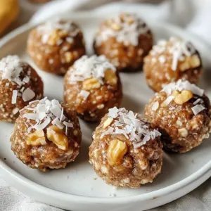 To make delicious Cinnamon Roll Protein Bites, you need some key ingredients. Here&rsquo;s what you will need: - 1 cup rolled oats - 1/2 cup vanilla protein powder - 1/4 cup almond flour - 1/4 cup pure maple syrup - 2 tablespoons almond butter (or any preferred nut butter) - 1 teaspoon ground cinnamon - 1/2 teaspoon pure vanilla extract - Optional add-ins: - 1/4 cup finely chopped walnuts or pecans - 1/4 cup unsweetened shredded coconut - A pinch of salt Each ingredient plays a vital role. Rolled oats provide fiber and texture. Vanilla protein powder adds protein and sweetness. Almond flour gives a nutty flavor and is gluten-free. Pure maple syrup serves as a natural sweetener. Almond butter adds creaminess and healthy fats. Ground cinnamon brings warmth and spice. Pure vanilla extract enhances the overall taste. You can also get creative. Adding walnuts or pecans gives a nice crunch. Shredded coconut adds a tropical flair. Feel free to adjust these add-ins based on what you have. Enjoy customizing your bites! {{ingredient_image_2}} First, grab a large mixing bowl. In this bowl, add 1 cup rolled oats, 1/2 cup vanilla protein powder, and 1/4 cup almond flour. Mix these ingredients well. You want to break up any clumps. This step is key for a smooth texture. Next, sprinkle in 1 teaspoon ground cinnamon and a pinch of salt. Stir this mixture until everything is combined evenly. Now, take another bowl to prepare the wet mixture. Pour in 1/4 cup pure maple syrup, 2 tablespoons almond butter, and 1/2 teaspoon pure vanilla extract. Whisk these together until they blend into a smooth, creamy mix. This part adds sweetness and flavor to our bites. Next, it's time to mix the wet and dry ingredients. Gradually pour the wet mixture into the dry bowl. Stir until all the ingredients come together into a dough. If you want, fold in 1/4 cup finely chopped walnuts or pecans and 1/4 cup unsweetened shredded coconut for extra crunch. Now, take about one tablespoon of the mixture and roll it into a small ball. Repeat this until you shape all the dough into bite-sized balls. Place the balls on a tray lined with parchment paper. Finally, pop the tray in the fridge for about 30 minutes. This helps the protein bites firm up. Enjoy them chilled or at room temperature! To get the best texture in your protein bites, start by mixing the dry ingredients well. Combine the rolled oats, vanilla protein powder, almond flour, ground cinnamon, and a pinch of salt in a large bowl. Make sure there are no clumps. Clumps can cause uneven bites. When you add the wet mixture, mix gently. This keeps the texture smooth. If you handle it too much, the bites can be tough. Aim for a soft, tender mix that holds together well. For a stunning display, serve your protein bites on a nice plate. You can drizzle extra almond butter over the bites. This adds flavor and looks great. Sprinkle some cinnamon or shredded coconut on top for color and flair. If you want to make it more fun, arrange the bites in a pyramid shape. This creates height and makes the snack pop. You can also use small cupcake liners for each bite. It adds a cute touch while making clean-up easier. Cinnamon Roll Protein Bites pack a punch of protein. Each bite has about 4-5 grams of protein. This helps build muscles and keeps you full longer. They are also a great snack option. They have healthy fats from almond butter and walnuts. Plus, they are sweetened with pure maple syrup, which is better than refined sugars. Eating these bites can satisfy your sweet tooth without the guilt. Enjoy them post-workout or anytime you need a pick-me-up! Pro Tips Storage Solution: Keep your protein bites in an airtight container in the fridge to maintain their freshness for up to a week. Flavor Variations: Experiment with different nut butters, such as cashew or peanut, to create unique flavor profiles. Boosting Texture: For a crunchier bite, consider adding sunflower seeds or pumpkin seeds along with the nuts. Pre-Workout Snack: Enjoy these bites about 30 minutes before your workout for a quick energy boost. {{image_4}} You can add cocoa powder to your protein bites for a chocolate twist. Just mix in one or two tablespoons with the dry ingredients. This simple change will turn your bites into a rich treat. Experimenting with different nut butters can also change the flavor. You can use peanut butter, cashew butter, or sun butter. Each nut butter gives a unique taste and texture. This lets you customize your bites to suit your mood or cravings. For those who need gluten-free options, simply swap the rolled oats for certified gluten-free oats. This keeps the bites safe and tasty for everyone. If you want vegan-friendly options, replace the protein powder with a plant-based version. Also, ensure your maple syrup is pure and not mixed with anything else. This way, you can enjoy a healthy snack without any animal products. You can add more nuts or seeds for extra crunch. Try sunflower seeds, chia seeds, or sliced almonds. These add flavor and boost the nutrition of your protein bites. If you like dried fruit, consider adding raisins, cranberries, or chopped apricots. They bring sweetness and a chewy texture. This makes your bites even more delicious and fun to eat. To keep your protein bites fresh, store them in an airtight container in the fridge. This helps maintain their taste and texture. You can layer parchment paper between bites to prevent them from sticking together. If you plan to eat them within a week, this method works great. You can freeze these protein bites for longer storage. Place them on a tray in a single layer and freeze until firm. After that, transfer them to a freezer-safe bag or container. Make sure to remove as much air as possible. For thawing, just leave them in the fridge overnight. If you need them fast, let them sit at room temperature for about 30 minutes. When stored properly, these protein bites last about one week in the fridge. If frozen, they can stay fresh for up to three months. Just remember to keep track of the date to enjoy them at their best! Cinnamon Roll Protein Bites are sweet, chewy snacks. They taste like cinnamon rolls but are healthier. You get protein from the powder and fiber from oats. They are perfect for a quick snack or post-workout treat. These bites are easy to make and fun to eat. You can enjoy them at room temperature or chilled. To make these bites, start by mixing dry ingredients. Combine rolled oats, vanilla protein powder, almond flour, ground cinnamon, and salt in a large bowl. In another bowl, whisk together maple syrup, almond butter, and vanilla extract. Pour the wet mix into the dry mix. Stir until everything blends well. Roll the mixture into small balls, about one tablespoon each. Place them on a tray and chill in the fridge for about 30 minutes. This helps them firm up. Yes, you can substitute the protein powder. If you do not have vanilla protein powder, try chocolate or unflavored. You can also use plant-based protein powder for a vegan option. Just be aware that this may change the flavor a bit. Cinnamon Roll Protein Bites are healthy for several reasons. They provide protein, which helps build muscle. The oats give you fiber, keeping you full. Almond butter adds healthy fats, which are good for your heart. Using pure maple syrup offers natural sweetness without refined sugar. Overall, they make a great snack choice! In this blog post, we explored how to create delicious Cinnamon Roll Protein Bites. We discussed key ingredients like rolled oats and almond butter, detailed step-by-step instructions, and shared tips for perfect texture and presentation. You can easily make variations to suit your taste, and we covered storage methods for freshness. With these simple recipes and tips, you can enjoy healthy snacks that satisfy your cravings. Healthy eating can be fun and easy!