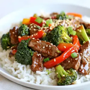 For this One-Pan Beef & Broccoli Stir-Fry, you will need: - 1 lb (450g) beef sirloin, thinly sliced against the grain - 3 cups broccoli florets, fresh or frozen - 1 red bell pepper, thinly sliced - 2 cloves garlic, finely minced - 1 inch piece of fresh ginger, finely minced - 1/4 cup soy sauce (low-sodium recommended) - 2 tablespoons oyster sauce (or additional soy sauce for a vegetarian option) - 1 tablespoon cornstarch - 1 tablespoon sesame oil for rich flavor - 2 tablespoons vegetable oil for cooking - Salt and freshly cracked black pepper to taste - 1 cup cooked rice (jasmine or brown rice work well) for serving You can easily swap some ingredients if needed. Here are a few ideas: - Use chicken or tofu instead of beef for a different flavor. - Broccoli can be replaced with green beans or snow peas. - If you don&rsquo;t have oyster sauce, use more soy sauce or hoisin sauce. - You can skip sesame oil; olive oil works fine, though it won&rsquo;t have the same taste. Garnishes add that final touch! Consider these options: - Sprinkle sesame seeds for a nice crunch. - Add sliced green onions for a fresh bite. - A drizzle of spicy chili oil can give it a kick. - Fresh cilantro can also brighten up the dish. Feel free to mix and match based on what you have on hand! {{ingredient_image_2}} Start by marinating the beef. Take 1 pound of beef sirloin and slice it thin against the grain. In a medium bowl, mix the beef with 1/4 cup of soy sauce, 2 tablespoons of oyster sauce, and 1 tablespoon of cornstarch. Add a pinch of black pepper. Stir well to coat the beef. Let it sit for 15 minutes. This step makes the beef tender and flavorful. Now, heat a large pan or wok over medium-high heat. Add 2 tablespoons of vegetable oil. Once the oil is hot, add the marinated beef in a single layer. Stir-fry for 3 to 4 minutes. Look for a nice brown color and ensure the beef is cooked through. After that, remove the beef from the pan and put it on a plate. In the same pan, you may need a bit more oil. Add 2 cloves of minced garlic and 1 inch of minced ginger. Saut&eacute; these for about 30 seconds. You want to smell their wonderful aroma. Be careful not to burn them, as burnt garlic can ruin the dish. Next, toss in 3 cups of broccoli florets and 1 sliced red bell pepper. Stir-fry these for about 4 to 5 minutes. You want the vegetables to be tender but still have a crisp bite. Stir occasionally to cook them evenly. Return the cooked beef to the pan with the vegetables. Drizzle 1 tablespoon of sesame oil over the mixture. Gently toss everything together. Stir-fry for another 2 to 3 minutes. This allows the flavors to blend nicely. Taste your stir-fry. Adjust the seasoning with salt and freshly cracked black pepper as needed. If you want it saucier, add a splash of water or more soy sauce. Serve hot over 1 cup of cooked rice. Optionally, garnish with sesame seeds and sliced green onions for a tasty finish. To cook beef just right, slice it thinly against the grain. This keeps it tender. Marinate the beef for at least 15 minutes. The marinade helps it soak up flavor. Use low-sodium soy sauce to control saltiness. Stir-fry in a hot pan for just 3-4 minutes. This keeps the beef juicy and flavorful. To keep broccoli and bell peppers crisp, don&rsquo;t overcook them. Stir-fry them for only 4-5 minutes. You want them tender but still bright green. If using frozen broccoli, thaw it first. This way, it cooks evenly. Also, add the vegetables after the beef. This prevents them from getting soggy. Serve your beef and broccoli stir-fry over fluffy rice. Jasmine or brown rice works great. For a fresh touch, add green onions and sesame seeds on top. This adds flavor and looks nice. For a fun twist, try serving it in lettuce wraps. It&rsquo;s a great way to enjoy a light meal. Pro Tips Marinating Matters: Allowing the beef to marinate for at least 15 minutes not only enhances the flavor but also tenderizes the meat, making it more succulent. High Heat is Key: Stir-frying requires high heat to quickly cook the ingredients while preserving their color and crunch. Ensure your pan is hot before adding the beef. Vegetable Variety: Feel free to mix in other vegetables like snap peas or carrots for added color and nutrition. Just adjust cooking times according to their tenderness. Perfect Rice Pairing: Use day-old rice for best texture as it holds up better in stir-frys. Freshly cooked rice can become mushy when mixed with sauces. {{image_4}} You can easily make this dish vegetarian or vegan. Replace the beef with tofu or tempeh. Both options add great texture. Use soy sauce and vegetable broth for the base. Skip the oyster sauce or swap it for more soy sauce or a vegan hoisin sauce. This change keeps the flavors bold while making it plant-based. Feel free to add more veggies to your stir-fry. Snow peas, carrots, and bell peppers work well. You can also try mushrooms for an earthy taste. Each veggie adds color and nutrition. Just ensure they are cut into similar sizes for even cooking. Switching up the sauce can change the whole dish. Try adding hoisin sauce for sweetness or sriracha for heat. You can also mix in a bit of teriyaki sauce for a sweeter flavor. Adjust the sauce to your taste. This flexibility keeps the meal exciting and fresh every time you cook it. After you enjoy your One-Pan Beef & Broccoli Stir-Fry, store any leftovers in an airtight container. Make sure the stir-fry has cooled down first. Place it in the fridge. Your leftovers will stay fresh for up to three days. If you want to keep it longer, consider freezing it. To reheat, use a skillet over medium heat. Add a splash of water or soy sauce to keep it moist. Stir until heated through, usually about 5 minutes. You can also use a microwave. Heat in a microwave-safe bowl for about 1-2 minutes. Stir halfway to ensure even heating. If you plan to freeze your stir-fry, use a freezer-safe container. It&rsquo;s best to freeze it without rice. This keeps the rice from becoming mushy. Your stir-fry can last up to three months in the freezer. When you&rsquo;re ready to eat, thaw it overnight in the fridge before reheating. This keeps flavors intact. Yes, you can! Chicken, pork, or tofu work well in this dish. Simply slice them thinly, just like the beef. Each option brings its own flavor. Chicken tends to be milder and cooks quickly. Pork adds a bit more sweetness. Tofu is great for a vegetarian twist. Just make sure to adjust the cooking time based on the meat you choose. This stir-fry pairs nicely with rice. Jasmine or brown rice are great choices. You can also serve it with noodles for a change. If you want a side, try spring rolls or a simple salad. Each option adds a nice touch to your meal. To add heat, use red pepper flakes or chili sauce. You can also add sliced fresh chilies while cooking. Start with a small amount and taste as you go. This way, you can find the perfect level of spice for you! This blog post covered how to make a tasty beef and broccoli stir-fry. You learned about key ingredients, common swaps, and garnishes to enhance your dish. I provided step-by-step instructions to make cooking easy. We explored tips for perfect beef and crisp veggies, plus fun options to change it up. You also got storage tips for leftovers. When you're ready, try these recipes and share them. Cook smart and enjoy tasty meals with friends and family!