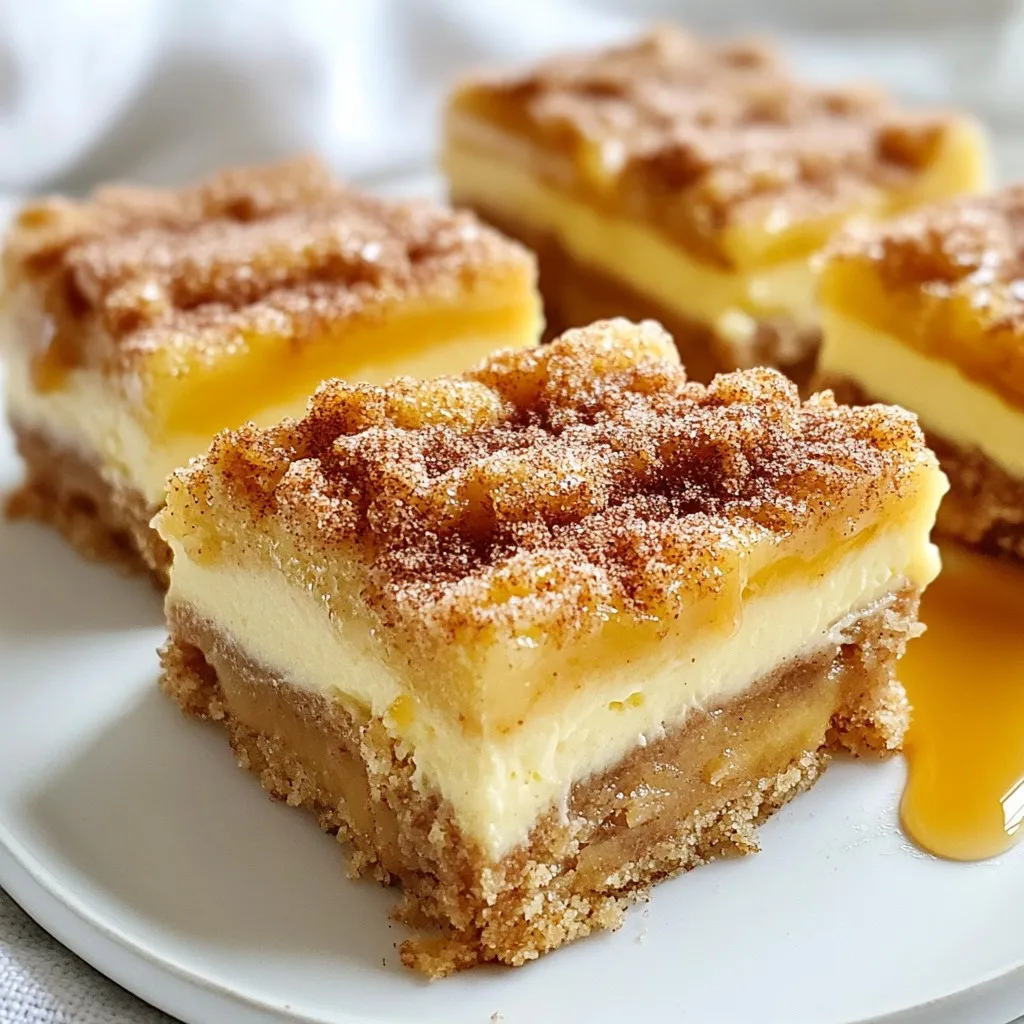 To make these churro cheesecake bars, you will need: - 1 cup all-purpose flour - 1/4 cup granulated sugar - 1/2 teaspoon baking powder - 1/4 teaspoon salt - 1/2 cup unsalted butter, softened - 1 large egg - 8 oz cream cheese, softened - 1/2 cup powdered sugar - 1 teaspoon vanilla extract - 1 teaspoon ground cinnamon - 1/4 cup granulated sugar (for coating) - 1/4 cup caramel sauce (optional) You can swap some ingredients if needed. For a gluten-free option, use gluten-free flour instead of all-purpose flour. Coconut sugar can replace granulated sugar for a different flavor. If you don't have cream cheese, use ricotta cheese for a lighter texture. For a vegan version, try a vegan cream cheese and substitute the egg with a flax egg. Always use fresh ingredients for the best taste. Check the expiration dates on dairy products like cream cheese and butter. For flour, store it in a cool, dry place to keep it fresh. Use pure vanilla extract for a richer flavor rather than imitation. When it comes to cinnamon, fresh ground cinnamon adds a wonderful aroma and taste. {{ingredient_image_2}} Start by preheating your oven to 350°F (175°C). This temp helps the bars bake evenly and become golden. Grab an 8x8-inch baking pan. Grease it with non-stick spray or line it with parchment paper. This makes removing the bars easy later on. In a medium bowl, mix together 1 cup of all-purpose flour, 1/4 cup of granulated sugar, 1/2 teaspoon of baking powder, and 1/4 teaspoon of salt. This is your dry mix. In a large bowl, use an electric mixer to beat 1/2 cup of softened unsalted butter with 1 large egg. Mix until it is creamy. Gradually add the dry mix to the wet mix. Keep mixing until a soft dough forms. In another bowl, beat 8 oz of softened cream cheese with an electric mixer. Mix until it is smooth. Add in 1/2 cup of powdered sugar, 1 teaspoon of vanilla extract, and 1 teaspoon of ground cinnamon. Keep mixing until everything blends well and becomes creamy. Take half of the dough and press it into the bottom of your greased pan. This forms the base. Then, carefully spread the cream cheese mixture over this layer. Make sure it is even. Crumble the rest of the dough on top of the cream cheese. Spread it out to ensure a good mix of textures. Put the pan in the oven and bake for 25-30 minutes. Look for a golden top and make sure the cheesecake layer is set. Once done, take the pan out and let it cool completely on a wire rack. After it cools, slice it into squares. Finish by sprinkling a cinnamon-sugar mix over the top. If you want, drizzle some caramel sauce on the side when you serve. Enjoy your delicious churro cheesecake bars! To create a smooth filling, start with room-temperature cream cheese. Cold cream cheese can cause lumps. Beat it well until creamy. Gradually add the powdered sugar, vanilla, and cinnamon. Mix until all ingredients blend smoothly. If you see lumps, keep mixing until you achieve that perfect creamy texture. Taste your filling before spreading it on the dough. You may want it sweeter or less sweet. If you prefer a sweeter bar, add more powdered sugar, a tablespoon at a time. For a less sweet option, reduce the sugar by the same amount. Balance is key, so find what suits your taste best. Avoid overmixing the dough; this can make it tough. When you press the dough into the pan, don’t pack it too tightly. It should be smooth but not dense. Also, watch the baking time. Overbaking can dry out the cheesecake filling. Aim for a golden top and a slightly jiggly center for the best texture. Pro Tips Chill the Cream Cheese: For an extra smooth filling, make sure your cream cheese is well-chilled before mixing. This helps achieve a creamier texture in the cheesecake layer. Check for Doneness: Keep an eye on the cheesecake bars as they bake. The edges should be set, while the center may still have a slight jiggle when you take them out of the oven. Use Parchment Paper: Lining your baking pan with parchment paper not only makes removing the bars easier but also prevents them from sticking to the pan, ensuring a clean cut. Customize the Topping: Feel free to add your favorite toppings! Chopped nuts, chocolate chips, or an extra sprinkle of cinnamon-sugar can elevate the flavor and presentation. {{image_4}} You can add fun flavors to your churro cheesecake bars. Try mixing in chocolate chips or a swirl of Nutella. For chocolate chips, just fold in 1/2 cup before spreading the cream cheese layer. If you want Nutella, add 1/4 cup to the cream cheese mixture after beating it. This gives a rich, chocolatey twist. To make gluten-free churro cheesecake bars, swap the all-purpose flour for a gluten-free blend. Look for a blend that works well in baking. Follow the same recipe steps. This way, you can enjoy the same great taste without gluten. You can make these bars vegan with a few easy swaps. Use plant-based butter instead of regular butter. For the cream cheese layer, try vegan cream cheese. Replace the egg with a flaxseed egg. Mix one tablespoon of flaxseed meal with three tablespoons of water and let it sit for five minutes. This mixture works great as a binding agent. You still get a tasty treat while keeping it vegan! To keep your churro cheesecake bars fresh, place them in an airtight container. Make sure they cool completely before storing. You can stack them with parchment paper between layers to avoid sticking. These bars stay tasty for up to three days in the fridge. You can freeze churro cheesecake bars for up to two months. First, let them cool completely. Then, cut them into squares and wrap each piece in plastic wrap. Place the wrapped bars in a freezer-safe bag or container. This way, you can enjoy a sweet treat later! To reheat, remove the desired amount from the fridge or freezer. If frozen, let them thaw in the fridge overnight. For warm bars, place them in the microwave for about 15-20 seconds. You can also reheat them in an oven at 350°F for about 10 minutes. Enjoy them warm with a drizzle of caramel sauce! Yes, you can make these bars a day before serving. Just let them cool completely. Then, store them in an airtight container in the fridge. This helps the flavors blend well. When you are ready to serve, sprinkle some cinnamon-sugar on top for extra flair. Your bars are done when the top is golden brown. The cheesecake layer should look set and not jiggly. A toothpick inserted in the center should come out clean. This means the center is cooked well. Keep an eye on them in the last few minutes to prevent burning. These bars pair well with a drizzle of caramel sauce. You can also serve with whipped cream or ice cream. Fresh fruit like strawberries or raspberries adds a nice touch too. For a crunch, consider nuts or chocolate chips on the side. These bars contain gluten and dairy, so they are not gluten-free or vegan. However, you can adapt the recipe. Use gluten-free flour and dairy-free cream cheese. This way, you can make a version for those with dietary restrictions. Always check labels for allergens. We covered how to make Churro Cheesecake Bars, from choosing ingredients to storing leftovers. You learned about ingredient swaps, baking steps, and fun variations. Remember to strive for the perfect filling and avoid common mistakes. These bars can fit many diets and delight everyone. Enjoy sharing this tasty treat with friends and family!