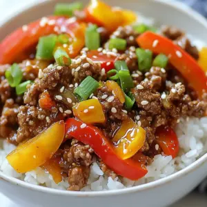 - 1 lb ground beef - 3 tablespoons soy sauce - 1 tablespoon brown sugar - 2 teaspoons sesame oil - 1 medium carrot, shredded - 1 cup bell peppers, diced - 2 green onions, finely chopped - Sesame seeds - 1 tablespoon gochujang (Korean chili paste) In this recipe, the main ingredients make the dish rich and tasty. Ground beef adds protein and a hearty base. Soy sauce gives it a savory kick. Brown sugar balances the saltiness with a hint of sweetness. Lastly, sesame oil adds a warm, nutty flavor that ties everything together. The vegetables bring color and crunch. I love using shredded carrots for their natural sweetness. Diced bell peppers add a pop of color and freshness. Green onions not only add flavor but also make the dish look beautiful. For garnish, sesame seeds add a lovely texture. Gochujang is key; it gives the dish its signature heat. Adjust the amount to suit your taste. With these ingredients, you create a bowl that sings with flavor! {{ingredient_image_2}} To start, grab a medium-sized bowl. In it, whisk together the following: - 3 tablespoons soy sauce - 1 tablespoon brown sugar - 2 teaspoons sesame oil - 3 cloves garlic, minced - 1 teaspoon fresh ginger, finely grated - 1 tablespoon gochujang Mix until everything blends well. This sauce adds flavor and depth to the beef. Next, heat a large skillet over medium heat. Add 1 pound of ground beef. Break it apart with a spatula as it cooks. Cook until it&rsquo;s evenly brown, with no pink left, about 5 to 7 minutes. This step is key for flavor. Once the beef is browned, drain any extra fat from the skillet. Pour the sauce mixture over the beef. Stir well to coat all the meat. Let it simmer gently for 3 to 4 minutes. This helps the sauce thicken and infuse flavor into the beef. To ensure ground beef is tender, use medium heat. This keeps the meat juicy. Break the beef apart gently while cooking. Avoid overcooking it, as this makes it dry. For the right sauce consistency, whisk your sauce well before adding it to the beef. Let it simmer for a few minutes. This thickens the sauce and blends the flavors. A colorful dish looks great! Serve the beef and veggies in a swirl over the rice. Use a mix of bell peppers for a bright look. Add a small bowl of kimchi on the side. This adds flavor and color. For garnishing, sprinkle sesame seeds on top. Toss some extra chopped green onions for a fresh touch. To boost flavor, add spices like black pepper or a pinch of paprika. Fresh herbs like cilantro can also add a nice touch. For side dishes, consider serving steamed broccoli or a fresh salad. These pair well and add nutrition. You can also try pickled vegetables for a tangy kick. Pro Tips Use Fresh Ingredients: Always opt for fresh vegetables and herbs to enhance the flavor and texture of your dish. Adjust Spice Levels: Feel free to modify the amount of gochujang to suit your personal spice tolerance, ensuring the dish is just right for you. Meal Prep Friendly: This recipe is perfect for meal prep. Make a larger batch and store it in the fridge for quick lunches or dinners throughout the week. Pairing Suggestions: Serve with pickled vegetables or a side of kimchi to bring out the authentic Korean flavors in your meal. {{image_4}} You can change the protein in this dish to suit your taste. Ground chicken or turkey makes a lighter option. Both will keep the dish flavorful. If you want a meatless meal, try tofu or tempeh. They soak up the sauce well and add a nice texture. If you need a gluten-free option, you can swap soy sauce for tamari. It has a similar taste. You can also mix in seasonal vegetables. Think zucchini in summer or kale in winter. This keeps the dish fresh and fun. Want more heat? Add extra gochujang to the meat mix. You can also toss in fresh chilies or a dash of hot sauce. For less spice, use less gochujang. Adjust it to match your family's taste. This way, everyone can enjoy the meal. Keep your Korean ground beef bowl in the fridge. Use an airtight container. This helps keep it fresh. The dish lasts about 3 to 4 days in the fridge. If you want to enjoy it later, don&rsquo;t forget to store it right. To enjoy your leftovers, use the microwave or stovetop. For the microwave, heat it in short bursts. Stir between to ensure even heating. On the stovetop, add a splash of water. Heat on low until warm. This keeps the beef moist and tasty. If you want to save some for later, freezing works well. Let the dish cool completely first. Then, place it in a freezer-safe container. Be sure to leave some space for expansion. It can last up to 3 months in the freezer. When ready to eat, thaw it overnight in the fridge. Reheat as mentioned above, and enjoy! You can serve several tasty sides with your Korean Ground Beef Bowl. Here are a few popular choices: - Kimchi: This fermented veggie adds spice and crunch. - Pickled Vegetables: These give a tangy contrast to the beef. - Steamed Broccoli: A healthy side that pairs well with the savory flavors. - Cucumber Salad: Refreshing and light, it balances the dish nicely. - Egg: A sunny-side-up egg on top can make it extra special. These sides enhance the meal and add more texture and flavor. Yes, you can easily add more heat to your Korean Ground Beef Bowl. Here are some tips: - More Gochujang: Add an extra tablespoon for a spicy kick. - Fresh Chilies: Slice up some fresh chilies and stir them in while cooking. - Chili Oil: Drizzle some chili oil over the finished bowl for extra heat. - Red Pepper Flakes: Mix in red pepper flakes to the sauce for added spice. Adjust the spice to your liking for the perfect heat level. Absolutely! This dish is great for meal prep. Here&rsquo;s how to include it in your weekly routine: - Batch Cooking: Make a double batch and store it in the fridge. - Containers: Use airtight containers to keep it fresh. - Rice Prep: Cook a large amount of rice to pair with the beef. - Mix and Match: Change up the veggies each week for variety. This way, you have quick and tasty meals ready to go. In this post, we explored the key ingredients for a Korean Ground Beef Bowl, including beef, soy sauce, and fresh veggies. I shared step-by-step instructions for creating a tasty sauce and cooking the beef to perfection. You learned tips for presentation and flavor enhancements, along with variations to suit your taste. For leftovers, I provided storage advice to keep your dish fresh. With a few simple tips, you can enjoy this dish multiple ways. Dive in and make this easy meal your next family favorite!